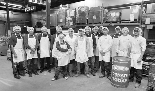 Group of 1848 employees volunteering at a food pantry