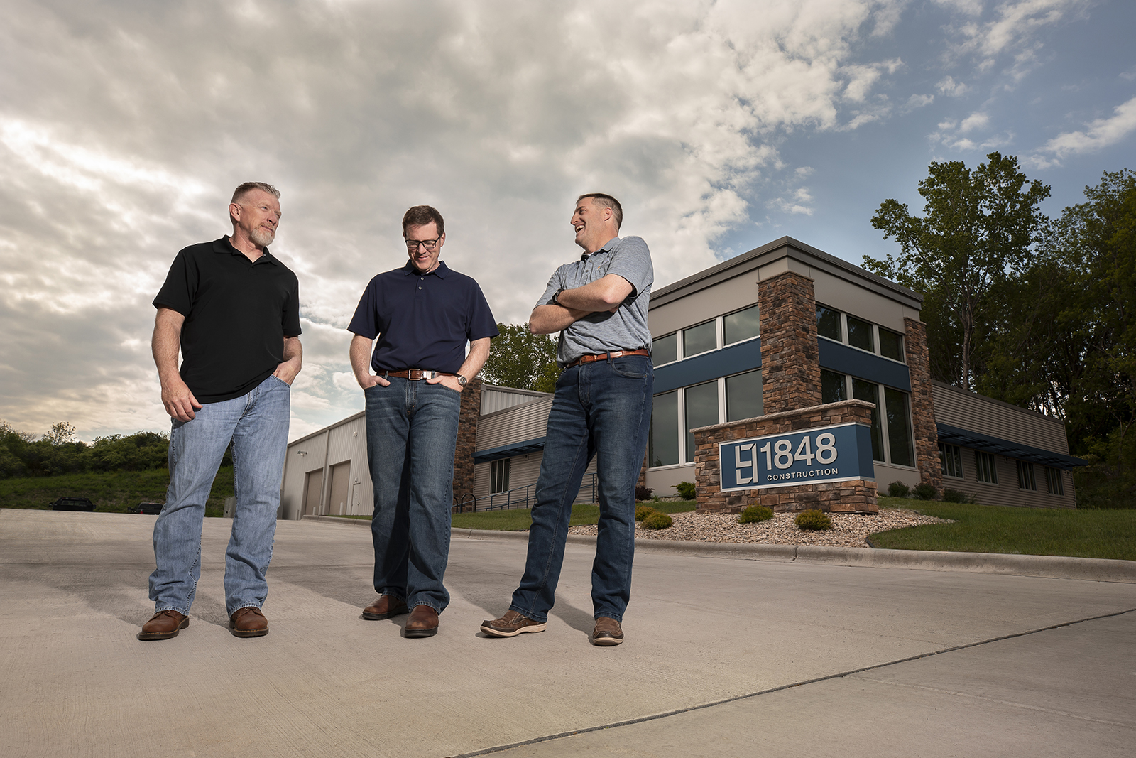 Owners of 1848 Construction in Driveway